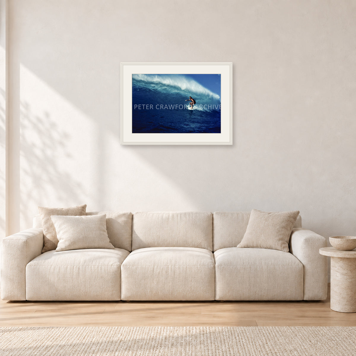 Michael Peterson, Sunset Beach 1975 by Peter Crawford — 60 × 40 cm, white frame with white mat, shown in a light minimalist living room.