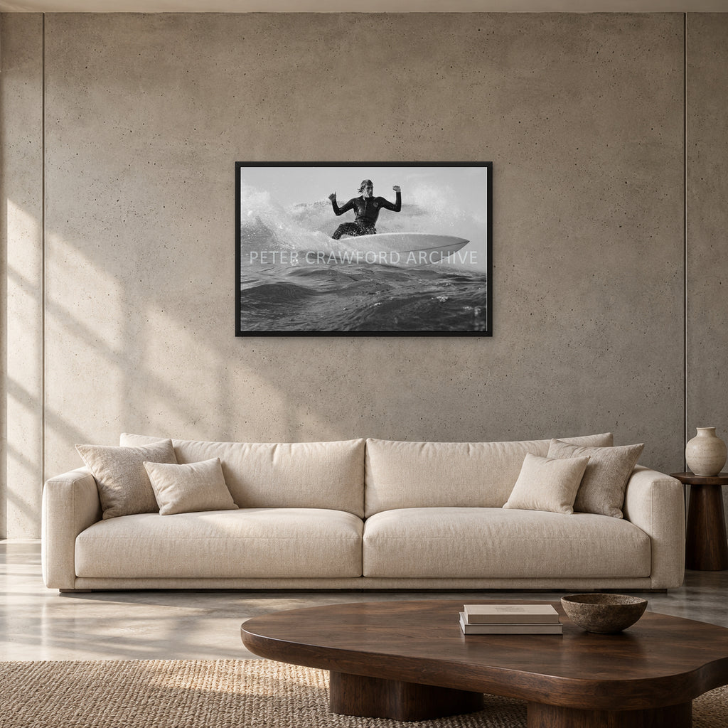 MP Cutback by Peter Crawford — 90 × 60 cm, black full frame, shown to scale in a contemporary concrete-wall living room.