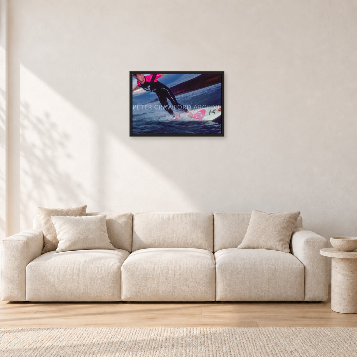 MR Bells 83 by Peter Crawford — 60 × 40 cm, black frame, shown in a light minimalist living room.