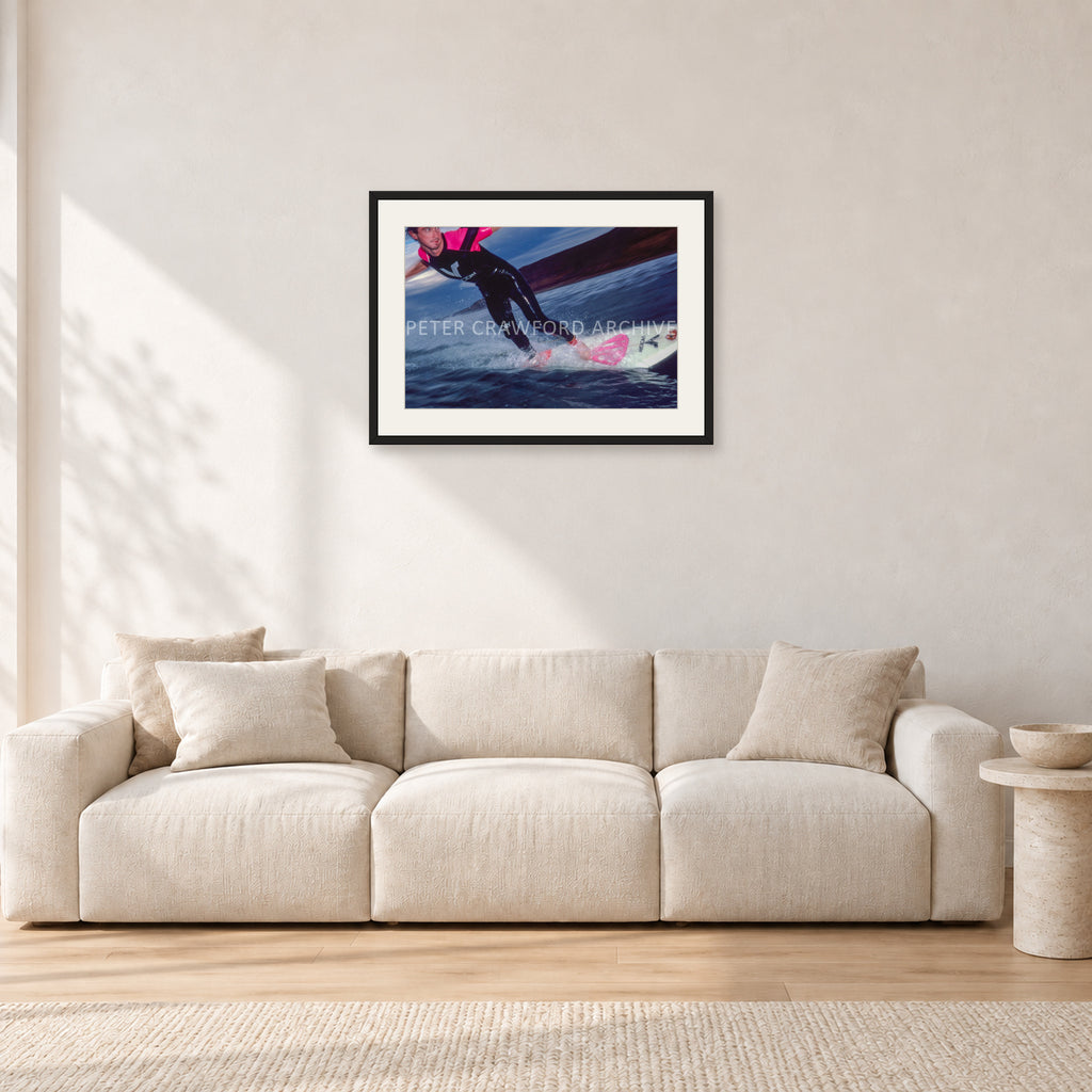 MR Bells 83 by Peter Crawford — 60 × 40 cm, black frame with white mat, shown in a light minimalist living room.