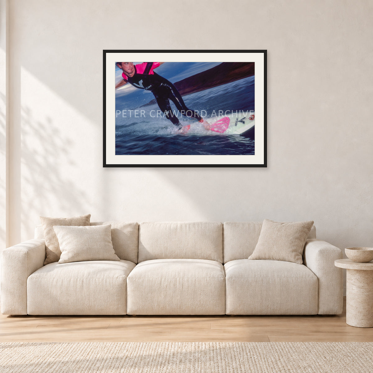MR Bells 83 by Peter Crawford — 90 × 60 cm, black frame with white mat, shown in a light minimalist living room.