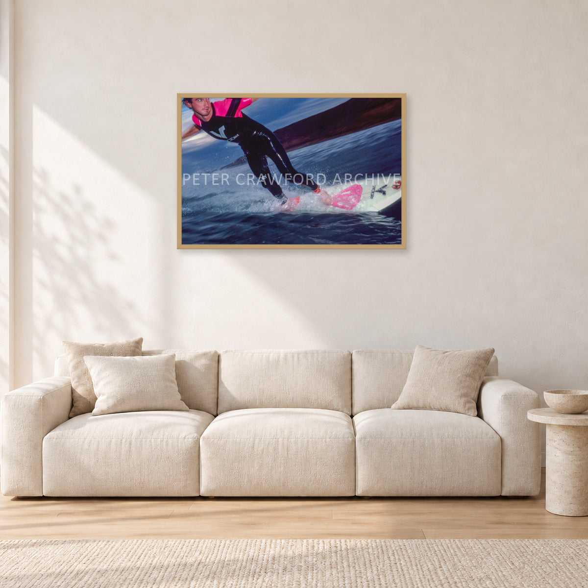 MR Bells 83 by Peter Crawford — 90 × 60 cm, hayseed frame, shown in a light minimalist living room.