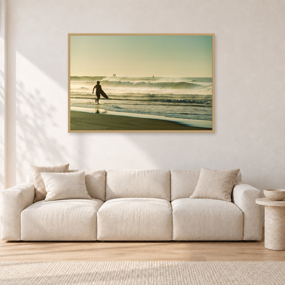Narrabeen Surfer Fish, Dawn 1991 by Peter Crawford — 120 × 80 cm, hayseed frame, shown in a light minimalist living room.