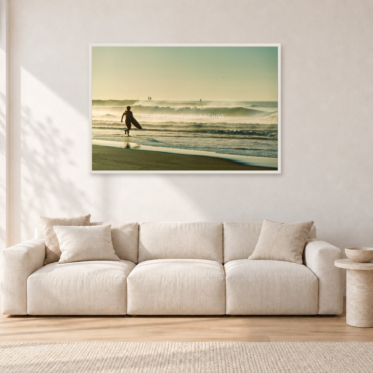 Narrabeen Surfer Fish, Dawn 1991 by Peter Crawford — 120 × 80 cm, white frame, shown in a light minimalist living room.