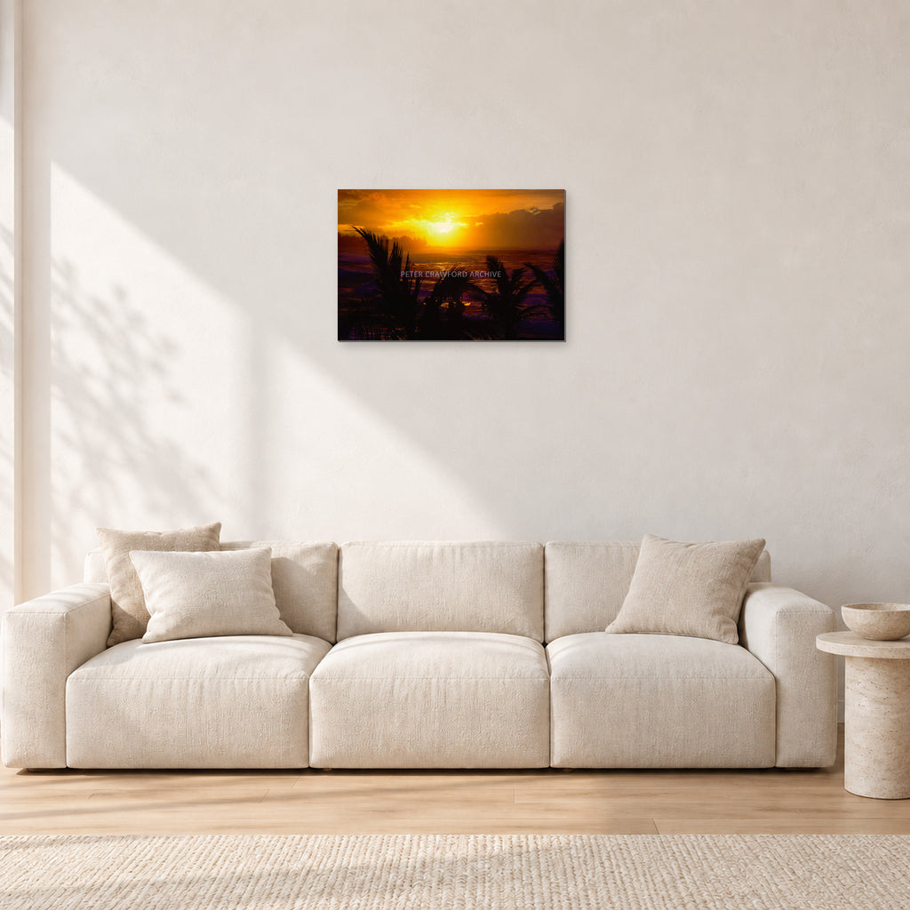 North Shore Sunset by Peter Crawford — 60 × 40 cm, aluminium-mounted resin print, shown in a light minimalist living room.