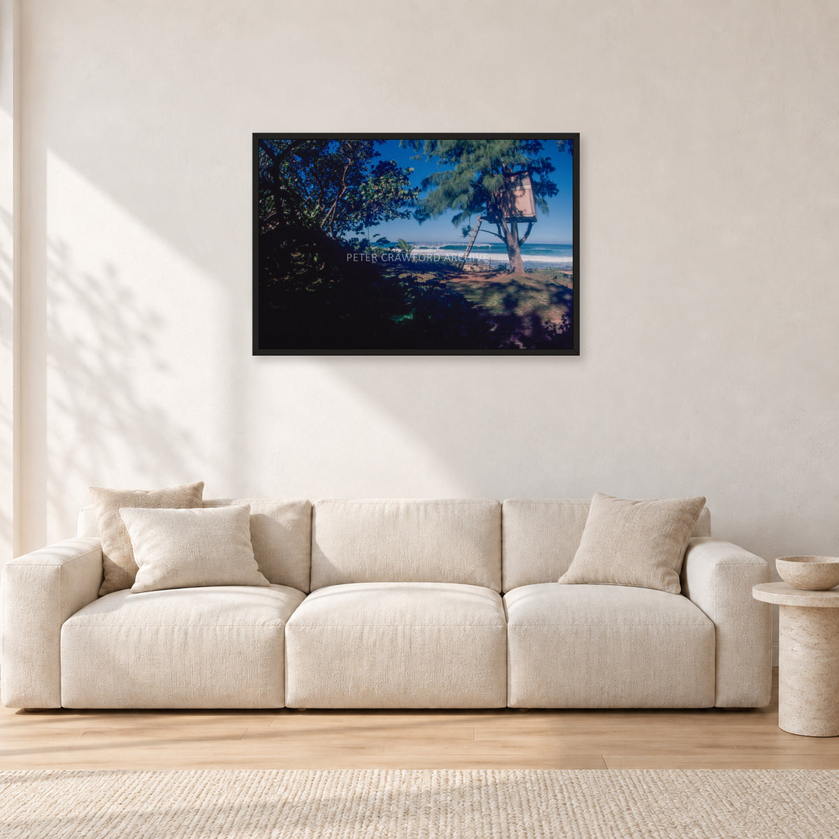 North Shore Tree House, 1978 by Peter Crawford — 90 × 60 cm, black frame, shown in a light minimalist living room.