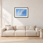 Occy Double Exposure, 1984 by Peter Crawford — 60 × 40 cm, black frame with white mat, shown in a light minimalist living room.