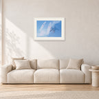 Occy Double Exposure, 1984 by Peter Crawford — 60 × 40 cm, white frame with white mat, shown in a light minimalist living room.