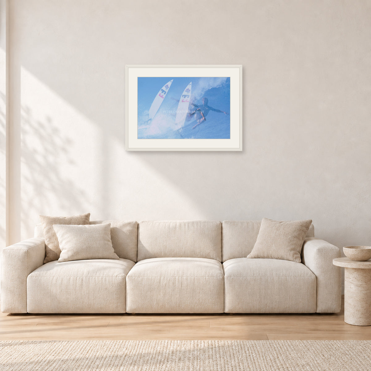 Occy Double Exposure, 1984 by Peter Crawford — 60 × 40 cm, white frame with white mat, shown in a light minimalist living room.