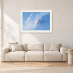 Occy Double Exposure, 1984 by Peter Crawford — 90 × 60 cm, white frame with white mat, shown in a light minimalist living room.