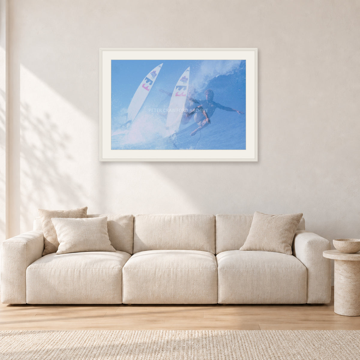 Occy Double Exposure, 1984 by Peter Crawford — 90 × 60 cm, white frame with white mat, shown in a light minimalist living room.