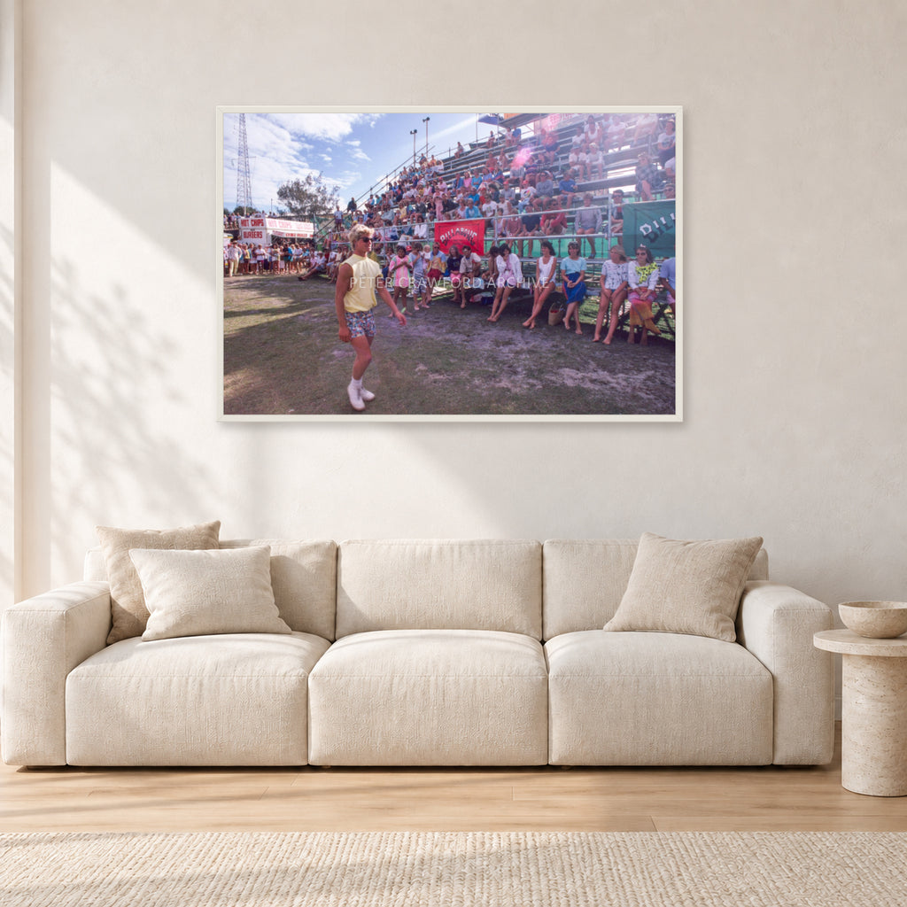 Occy, Duranbah by Peter Crawford — 120 × 80 cm, white frame, shown in a light minimalist living room.