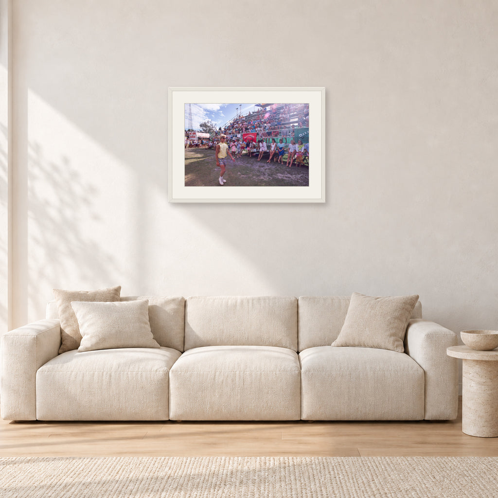 Occy, Duranbah by Peter Crawford — 60 × 40 cm, white frame with white mat, shown in a light minimalist living room.