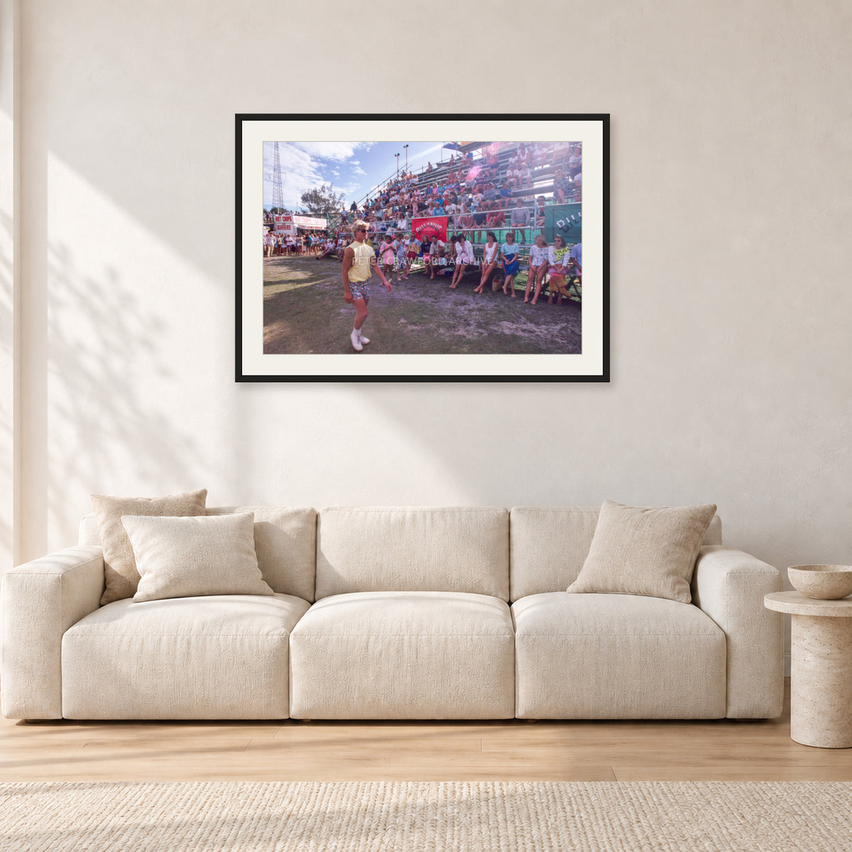 Occy, Duranbah by Peter Crawford — 90 × 60 cm, black frame with white mat, shown in a light minimalist living room.