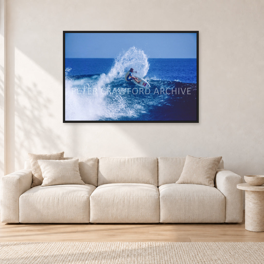 Occy, Top Turn 1984 by Peter Crawford — 120 × 80 cm, black frame, shown in a light minimalist living room.