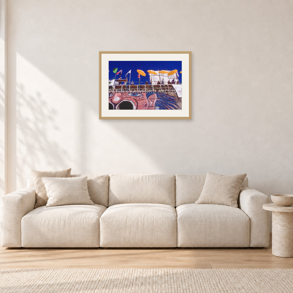 OP Bondi 87 OnTheNose by Peter Crawford — 60 × 40 cm, hayseed frame with white mat, shown in a light minimalist living room.