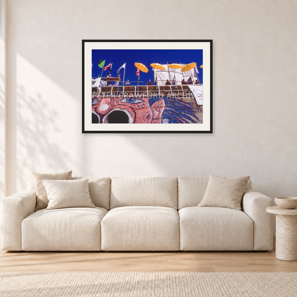 OP Bondi 87 OnTheNose by Peter Crawford — 90 × 60 cm, black frame with white mat, shown in a light minimalist living room.