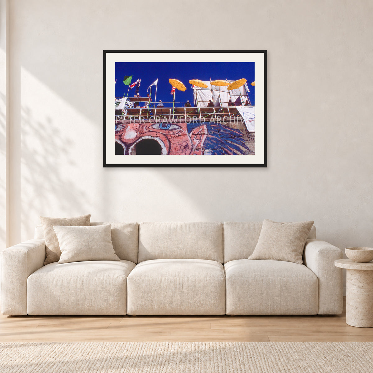 OP Bondi 87 OnTheNose by Peter Crawford — 90 × 60 cm, black frame with white mat, shown in a light minimalist living room.