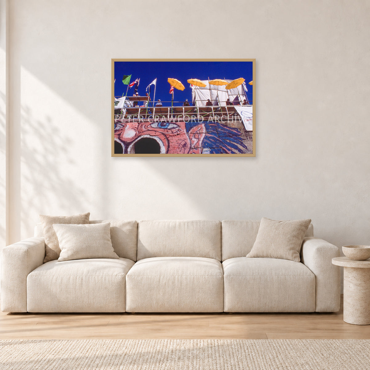 OP Bondi 87 OnTheNose by Peter Crawford — 90 × 60 cm, hayseed frame, shown in a light minimalist living room.