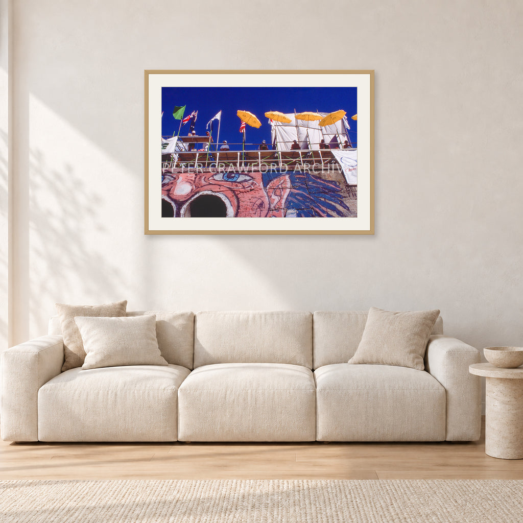 OP Bondi 87 OnTheNose by Peter Crawford — 90 × 60 cm, hayseed frame with white mat, shown in a light minimalist living room.