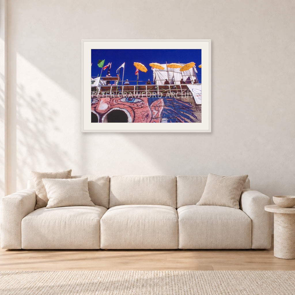 OP Bondi 87 OnTheNose by Peter Crawford — 90 × 60 cm, white frame with white mat, shown in a light minimalist living room.