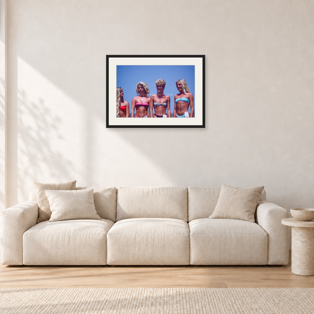 OP Pro Pageant, 1985 by Peter Crawford — 60 × 40 cm, black frame with white mat, shown in a light minimalist living room.