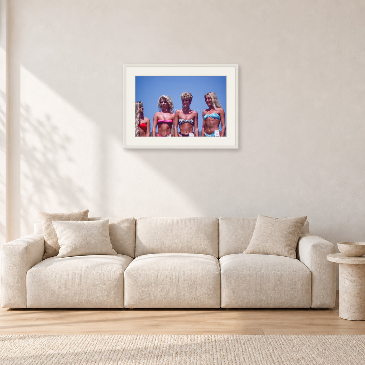 OP Pro Pageant, 1985 by Peter Crawford — 60 × 40 cm, white frame with white mat, shown in a light minimalist living room.