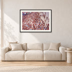 Op Pro Crowd 85 by Peter Crawford — 90 × 60 cm, black frame with white mat, shown in a light minimalist living room.