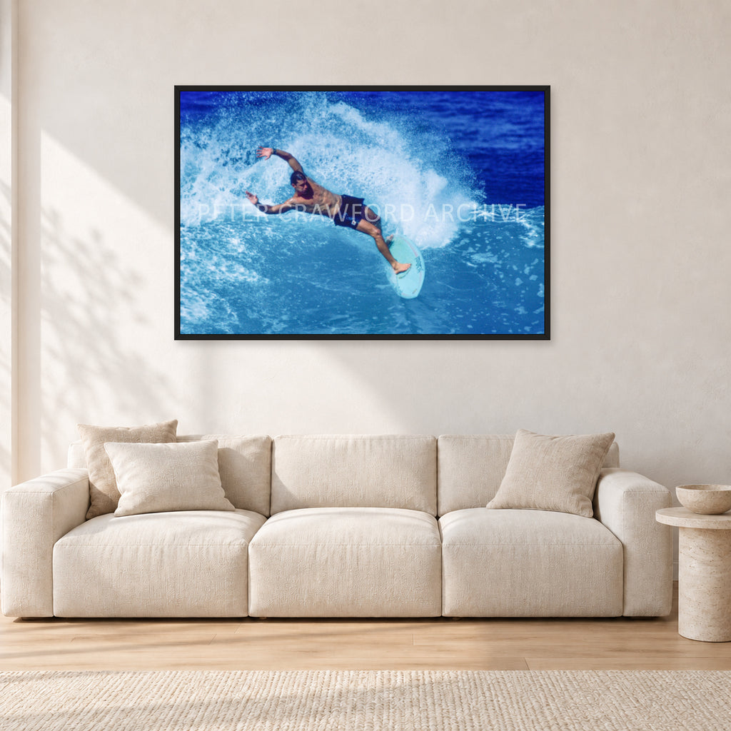 Paul Burnett, Hawaii 1989 by Peter Crawford — 120 × 80 cm, black frame, shown in a light minimalist living room.