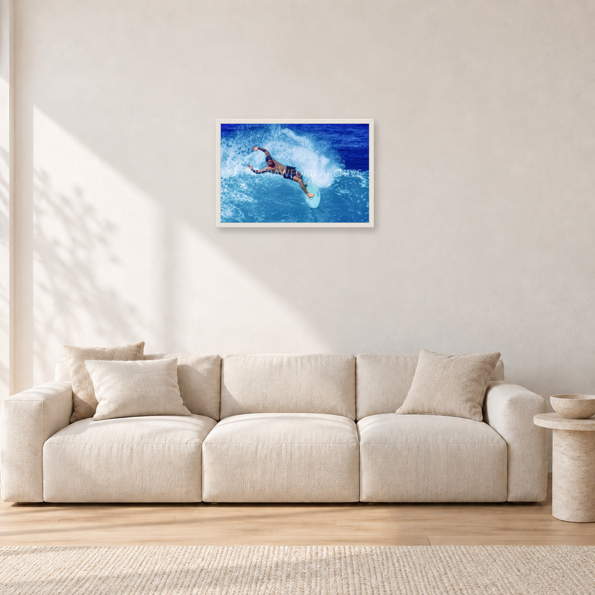 Paul Burnett, Hawaii 1989 by Peter Crawford — 60 × 40 cm, white frame, shown in a light minimalist living room.