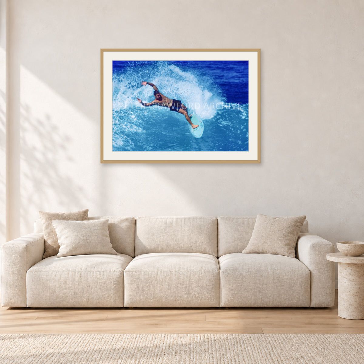 Paul Burnett, Hawaii 1989 by Peter Crawford — 90 × 60 cm, hayseed frame with white mat, shown in a light minimalist living room.
