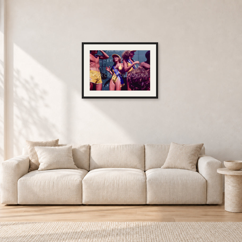 Peter Harris Champ ShowerStubbies 80 by Peter Crawford — 60 × 40 cm, black frame with white mat, shown in a light minimalist living room.