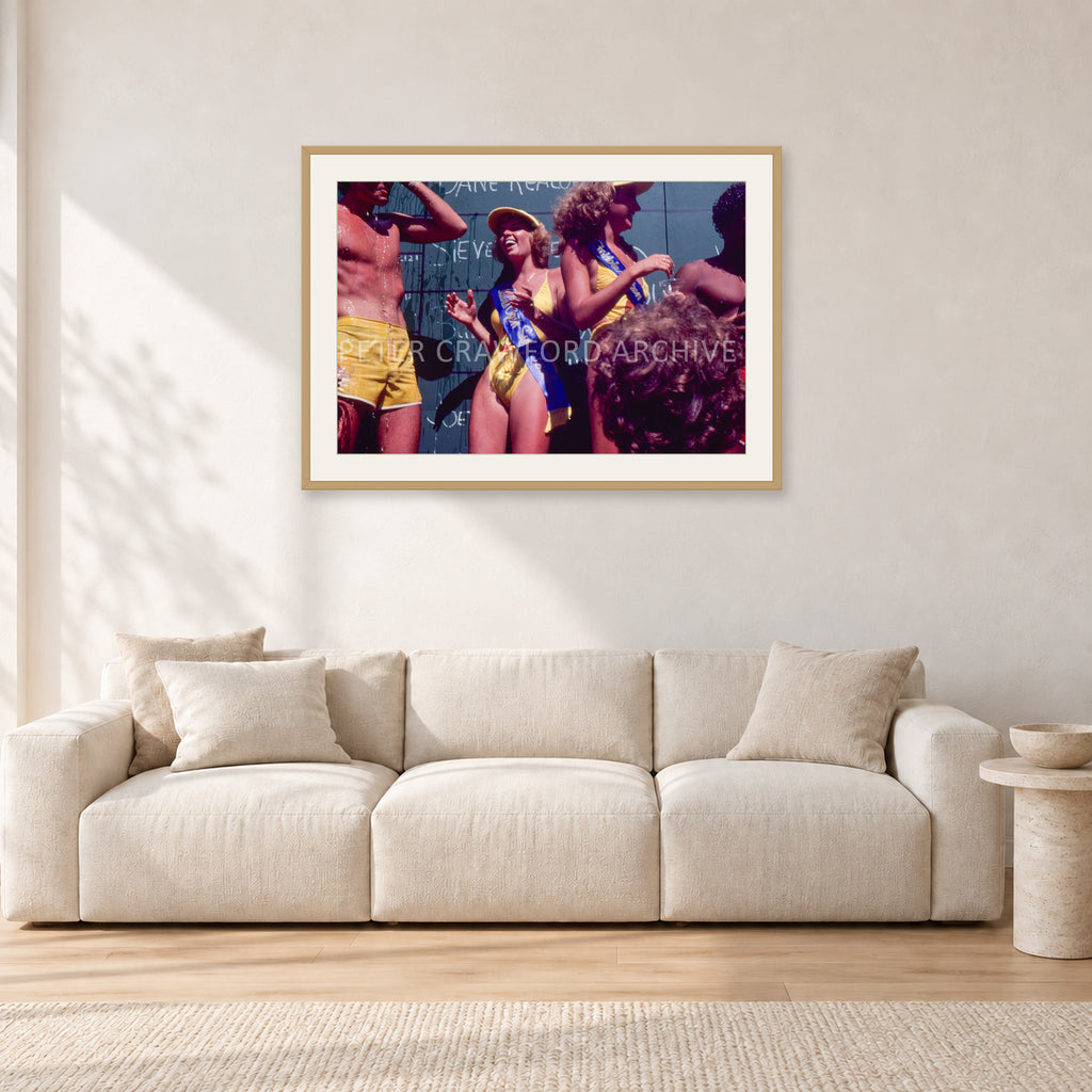 Peter Harris Champ ShowerStubbies 80 by Peter Crawford — 90 × 60 cm, hayseed frame with white mat, shown in a light minimalist living room.