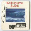 Jeff Hakman takes a high line at Sunset Beach on Oahu's North Shore. Peter Crawford Archive.