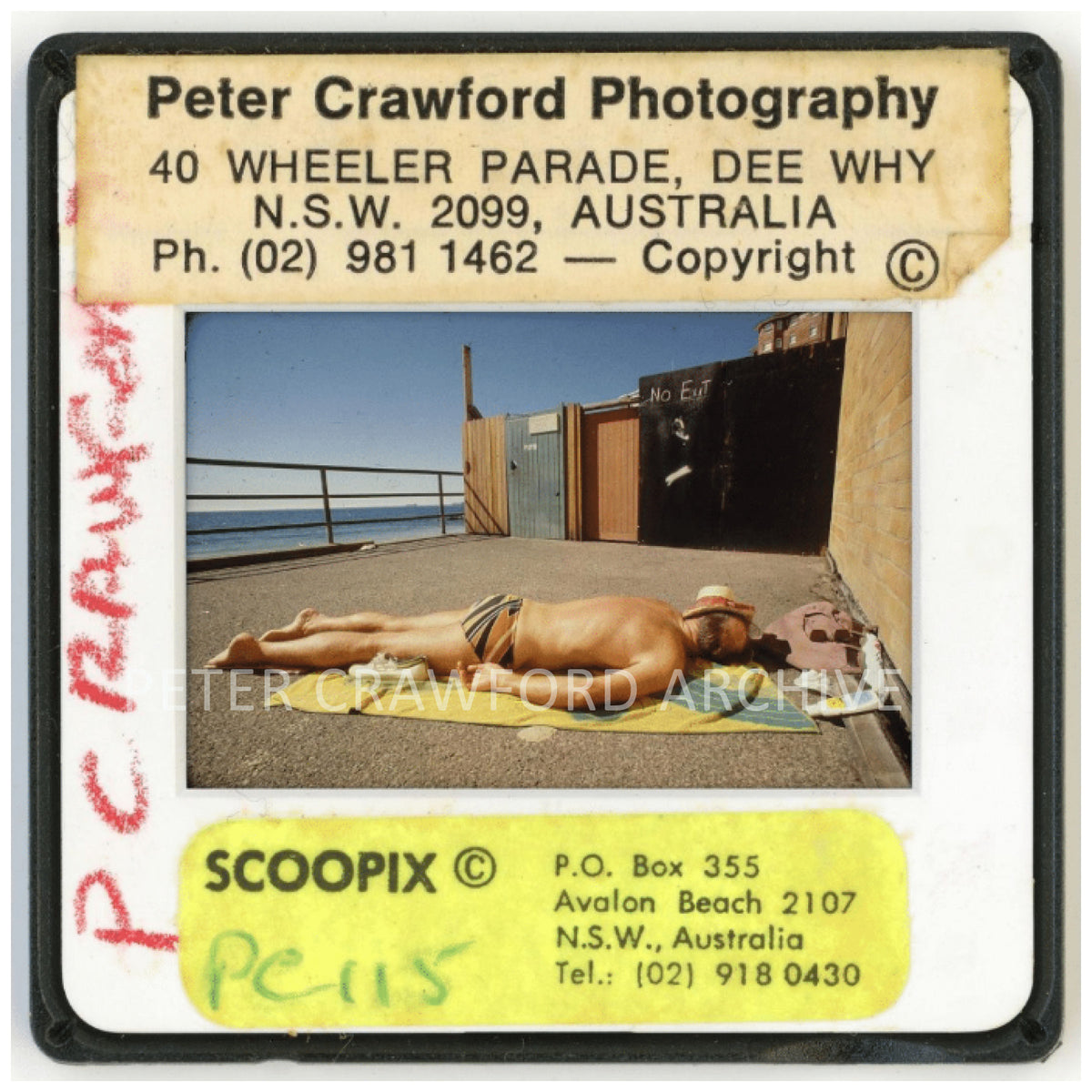 A sunbather on Manly Beach, captured in a candid moment from Sydney's Northern Beaches. Peter Crawford Archive.