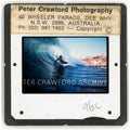 Peter Crawford rides a barrel at Dee Why, photographed by Art Brewer. Peter Crawford Archive.