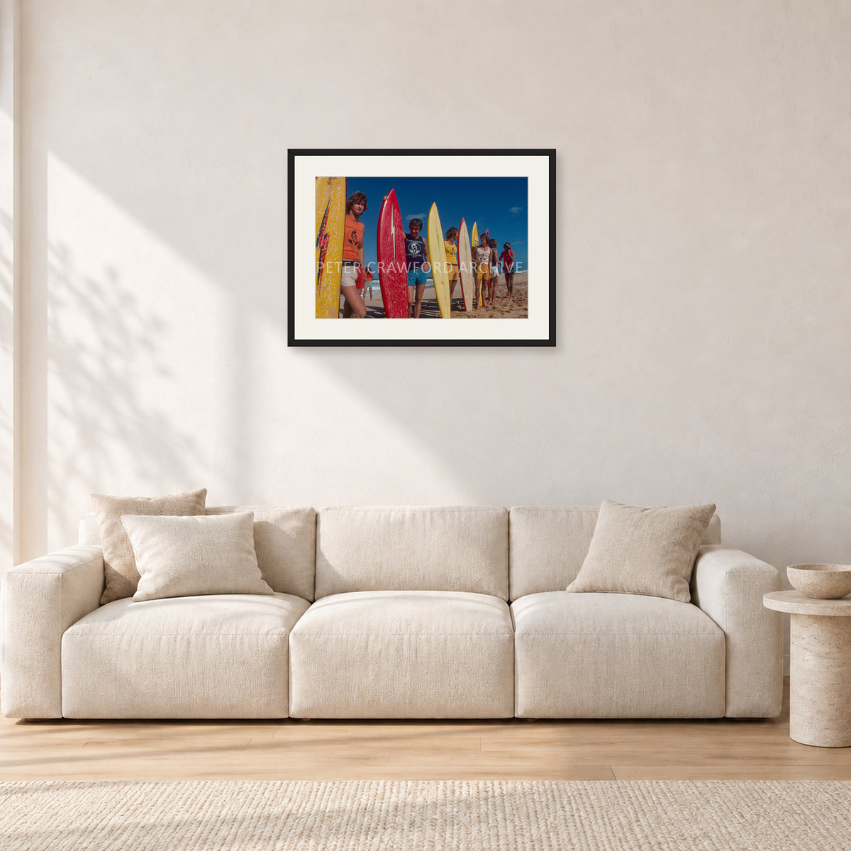 Pipe 76 Rory Russell Mike Armstrong Paul Naude by Peter Crawford — 60 × 40 cm, black frame with white mat, shown in a light minimalist living room.