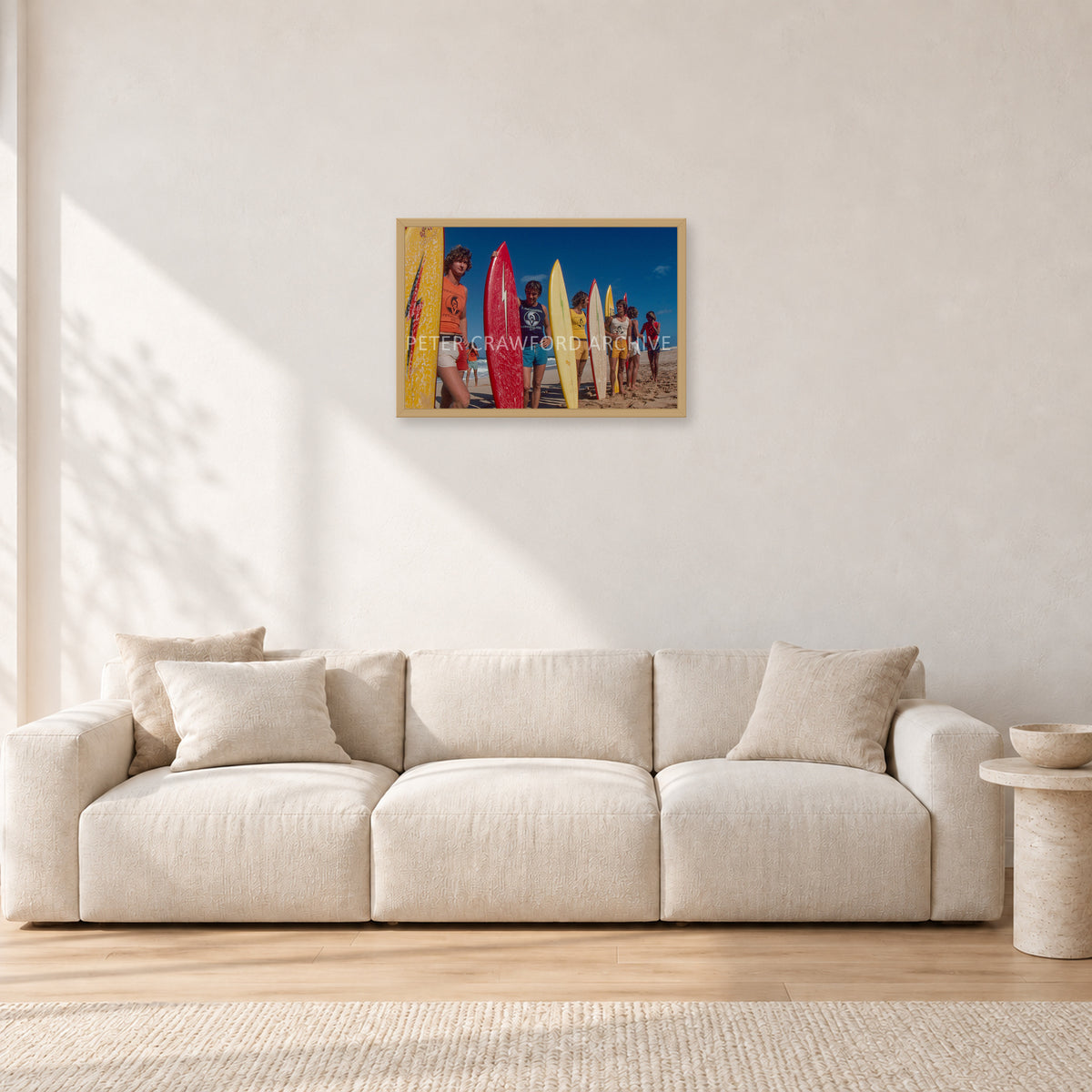 Pipe 76 Rory Russell Mike Armstrong Paul Naude by Peter Crawford — 60 × 40 cm, hayseed frame, shown in a light minimalist living room.