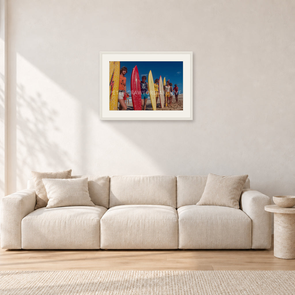 Pipe 76 Rory Russell Mike Armstrong Paul Naude by Peter Crawford — 60 × 40 cm, white frame with white mat, shown in a light minimalist living room.