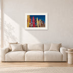 Pipe 76 Rory Russell Mike Armstrong Paul Naude by Peter Crawford — 60 × 40 cm, white frame with white mat, shown in a light minimalist living room.