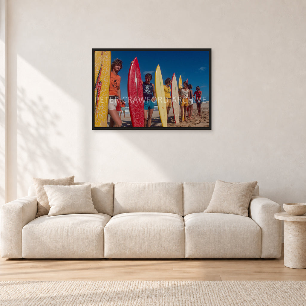 Pipe 76 Rory Russell Mike Armstrong Paul Naude by Peter Crawford — 90 × 60 cm, black frame, shown in a light minimalist living room.