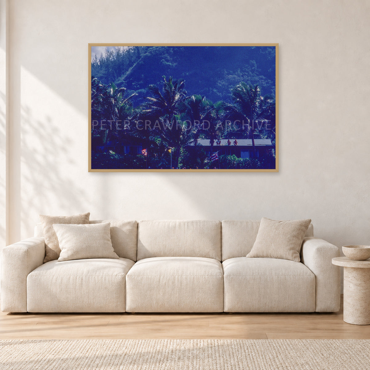 Pipe Final Crowd by Peter Crawford — 120 × 80 cm, hayseed frame, shown in a light minimalist living room.