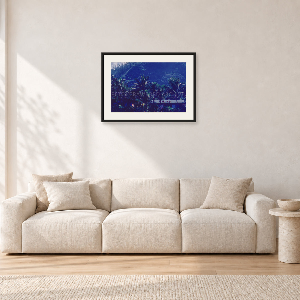 Pipe Final Crowd by Peter Crawford — 60 × 40 cm, black frame with white mat, shown in a light minimalist living room.