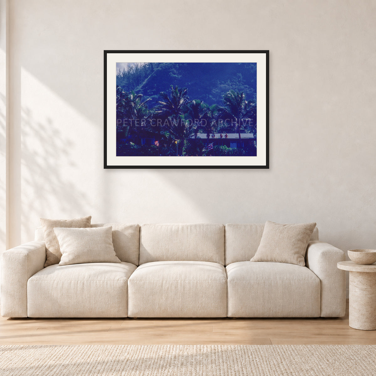 Pipe Final Crowd by Peter Crawford — 90 × 60 cm, black frame with white mat, shown in a light minimalist living room.