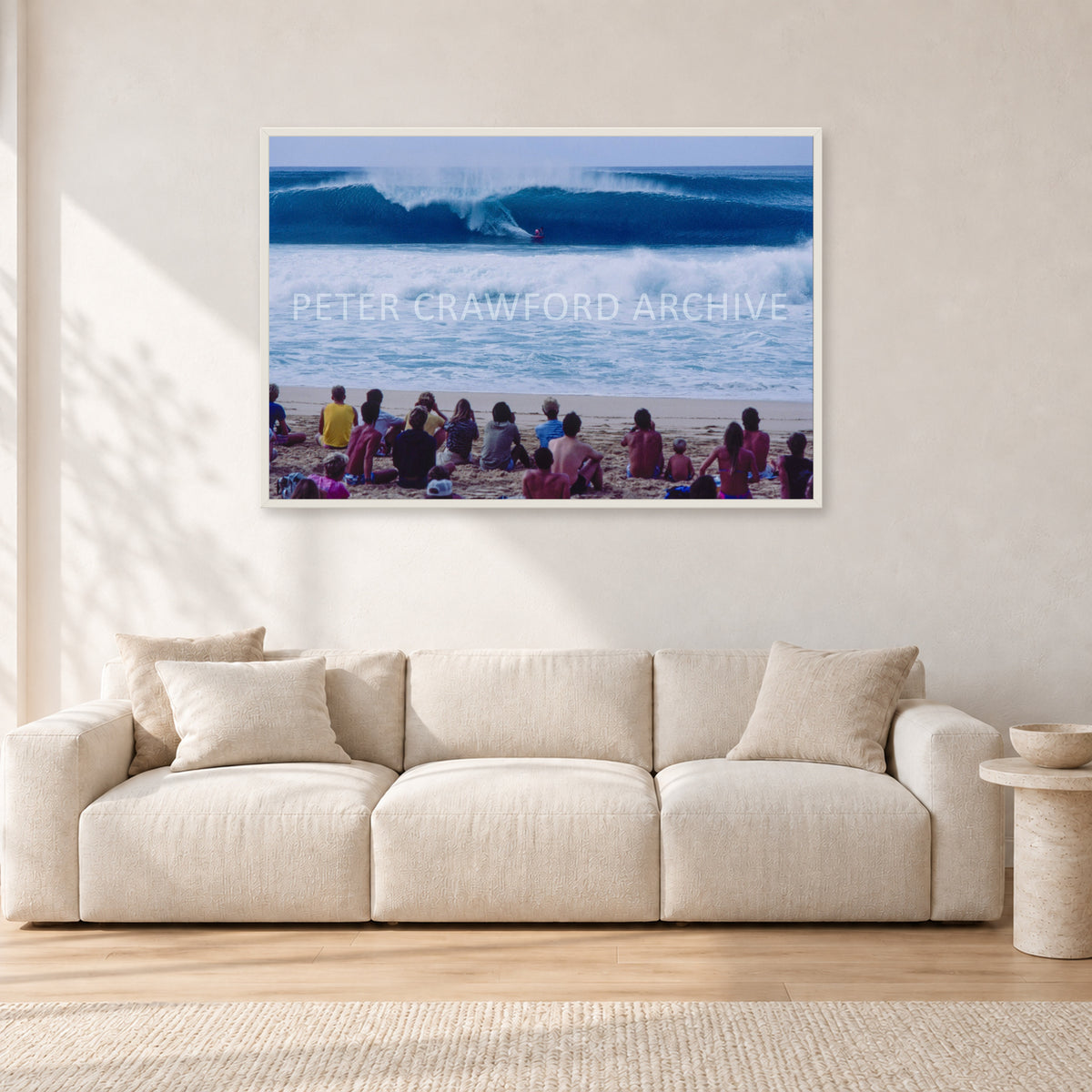 Pipe Masters, Pipeline 1988 by Peter Crawford — 120 × 80 cm, white frame, shown in a light minimalist living room.