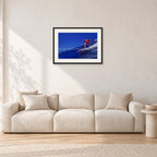 Rabbit Bartholomew, Stubbies 1978 by Peter Crawford — 60 × 40 cm, black frame with white mat, shown in a light minimalist living room.