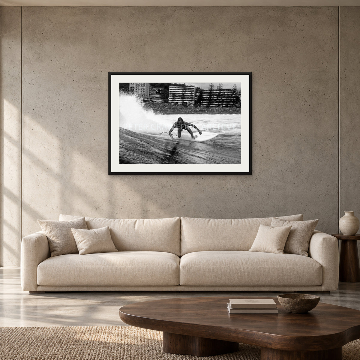 MP Stubbies by Peter Crawford — 90 × 60 cm, black frame with mat, shown to scale in a contemporary concrete-wall living room.