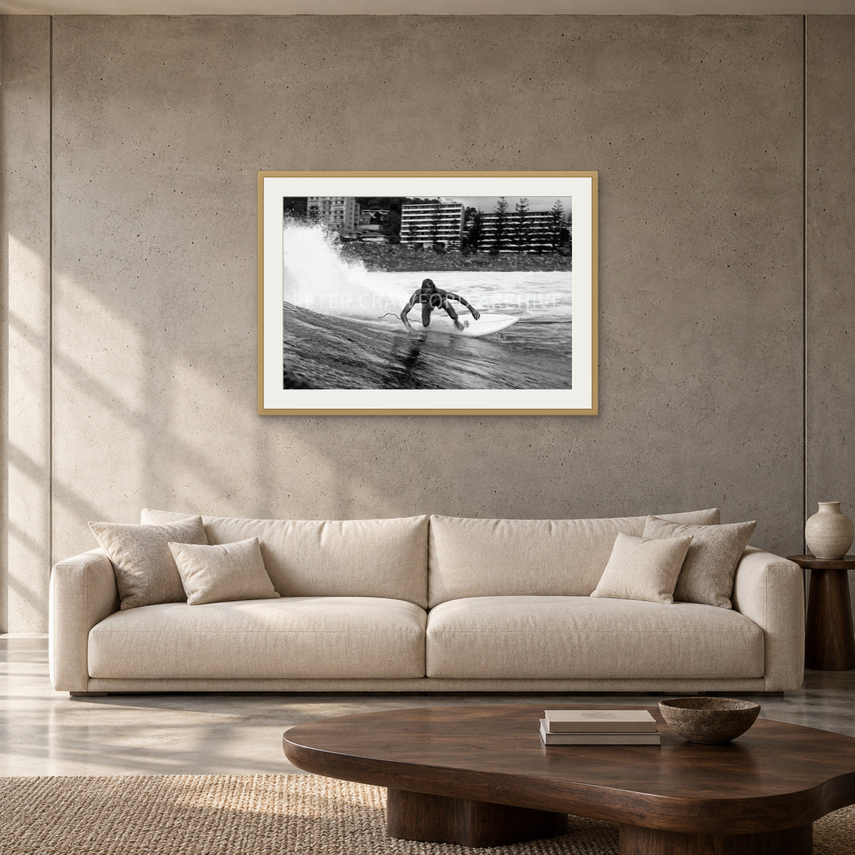 MP Stubbies by Peter Crawford — 90 × 60 cm, hayseed frame with mat, shown to scale in a contemporary concrete-wall living room.