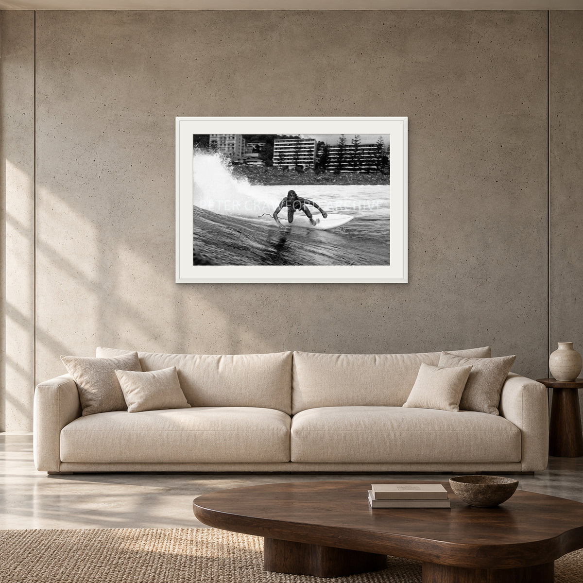 MP Stubbies by Peter Crawford — 90 × 60 cm, white frame with mat, shown to scale in a contemporary concrete-wall living room.