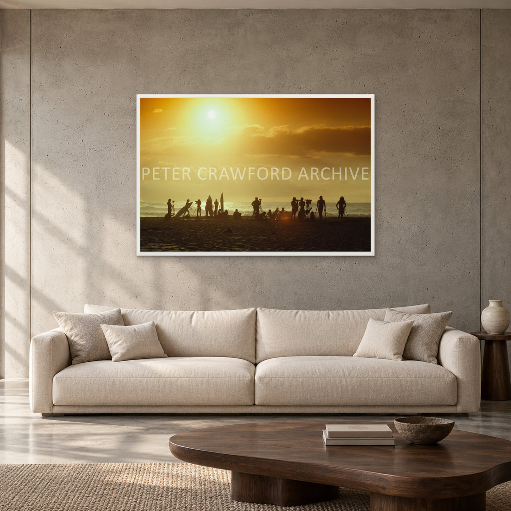 North Shore Sunset by Peter Crawford — 120 × 80 cm, white full frame, shown to scale in a contemporary concrete-wall living room.